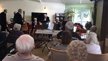 Bolton care home Residents enjoy performance from the Bury Veterans Choir